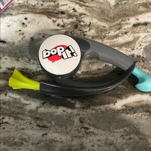 Bop It! Game with Gray and Yellow Accents